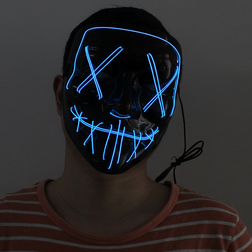 Person wearing a black mask with blue LED lights.