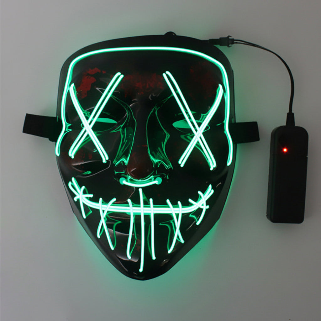 LED mask with green lights and power adapter on a white background.