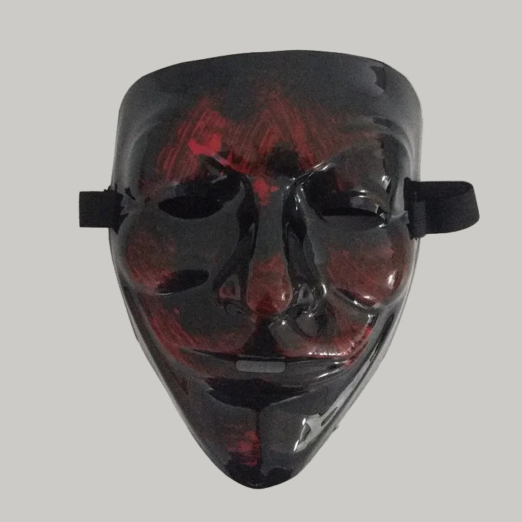 Black mask with red accents on a white background.
