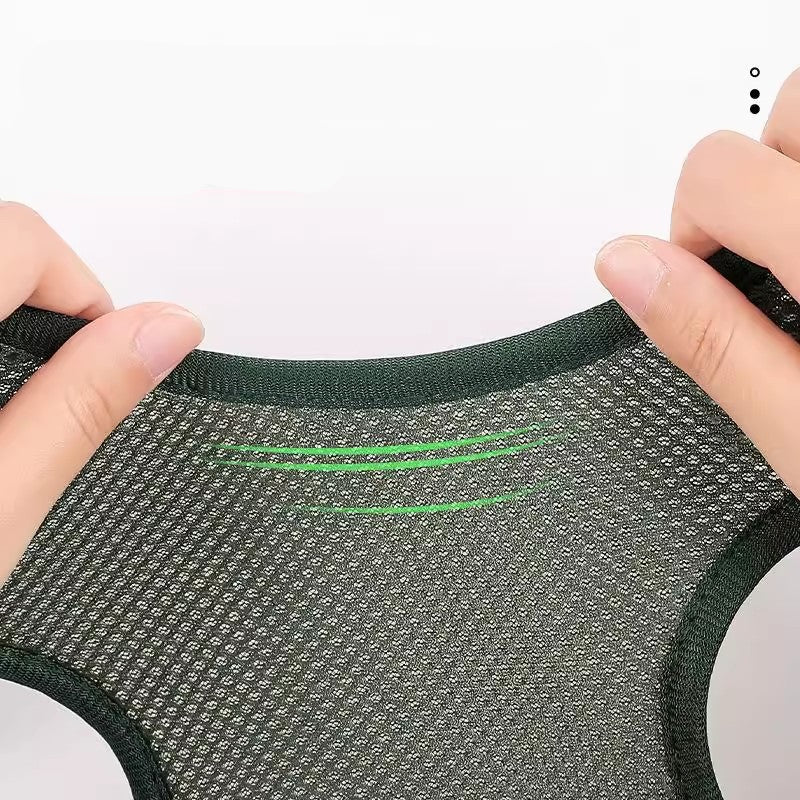 Textured green and gray fabric with green stitching, held by hands against a white background.